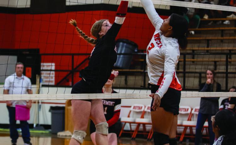 Lady Hornet Mylee Van Meter &amp; Lady Hammer Sierra Williams battle at the top of the net. The Lady Hornets will have tune up match against Albany this Saturday at 10am, while the Lady Hammers will play for Bi-district Monday, Oct. 31st against Trent.
