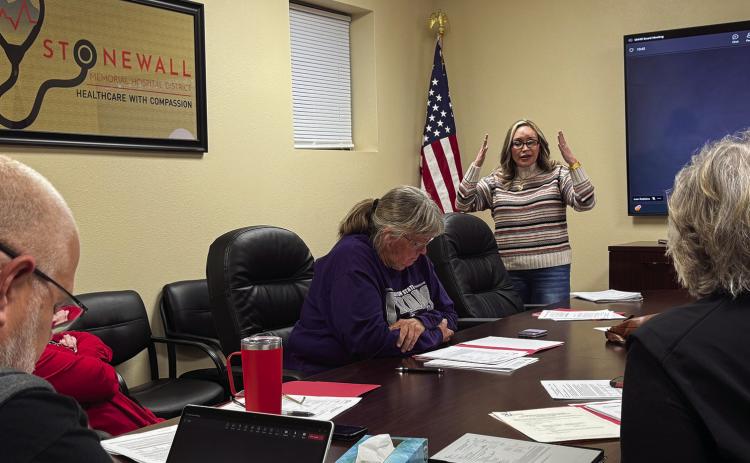 SMHD employee representative, Molly Wells, discusses new time-off policies at Monday’s meeting.