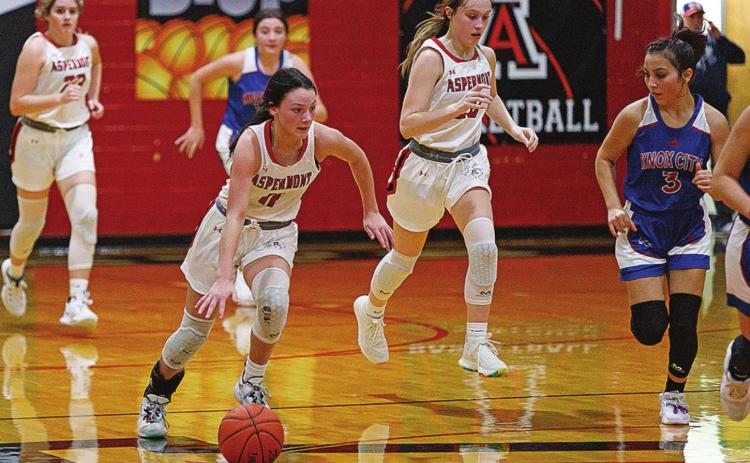 Lady Hornet Addi Shugart fast breaks down the court during Friday's 71-16 win over the Houndettes. Photo by: Mark Martinez