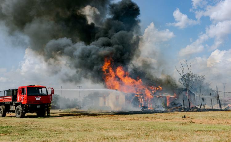 Fire engulfs vacant home