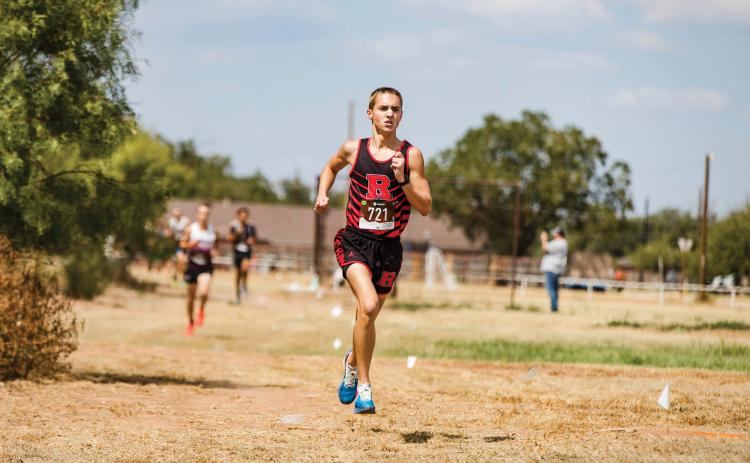 Roby Junior Camden Lummus leads the pack during the boys division of the Hamlin Invitational cross country meet last Wednesday. Roby, Rotan, &amp; Aspermont runners competed. Among some performances of note, Lummus finished 1st as an individual, the Aspermont boys finished 8th as a team, while the Roby Girls finished 5th overall as a team respectively. With two weeks left before district, our local teams are next set to compete this week at the Rotan Invitational meet. PHOTOS BY: MARK MARTINEZ