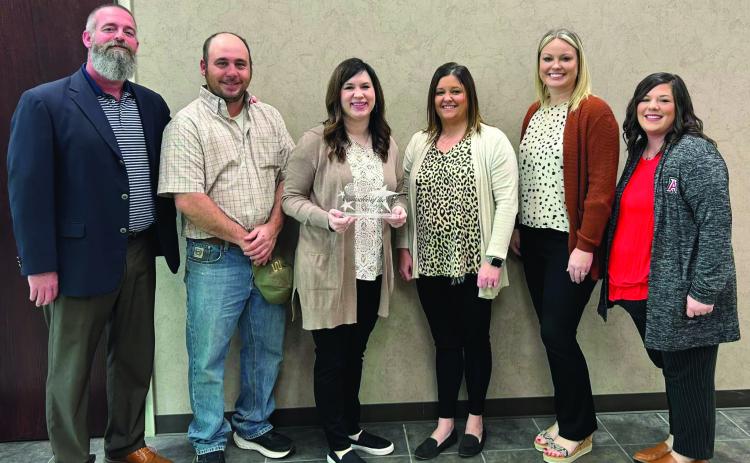 Friends and family were all in on the secret and had known for weeks that AISD's counselor, Teddye Myers had been selected as Counselor of the Year. Pictured l to r: AISD Superintendent Zach Morris, Tres and Teddye Myers, Charla Leonard HS Principal Tiffany Potts, &amp; Kristin Marsh.
