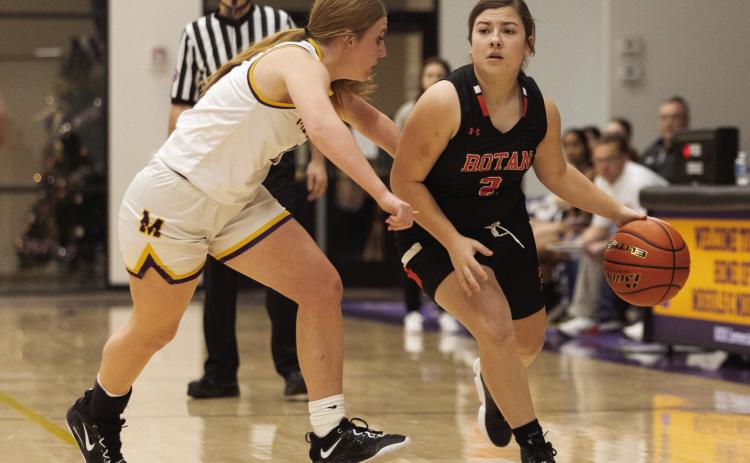 Lady Hammer junior Hayden Foster looks for open teammate during Rotan's close 47-52 loss to the Lady Moguls.