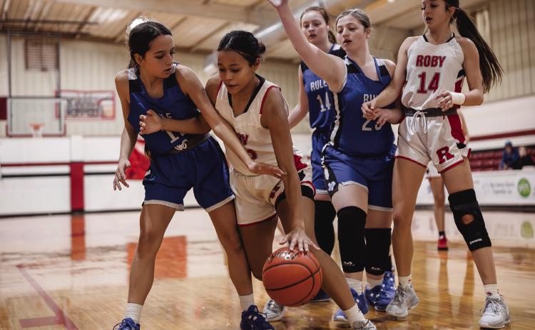 Roby Junior Joselynn Williams fights through Bobcat defenders during the Lady Lions 49-5 win over Rule. The Lady Lions next matchup will be against Knox City this Friday at 6pm. PHOTO BY TRICIA HURt