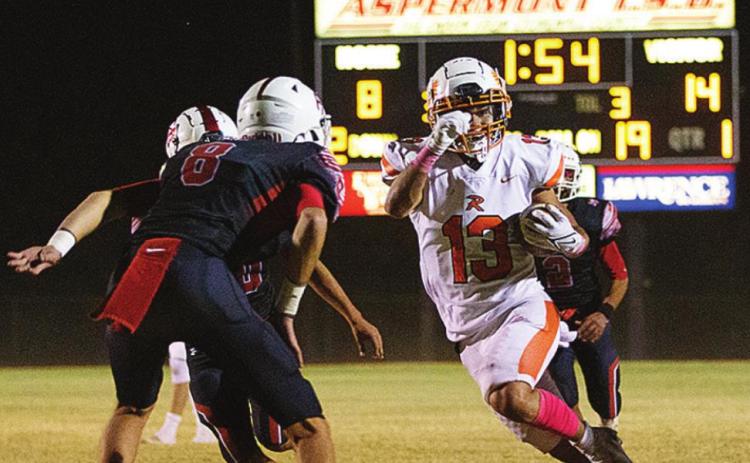 Rotan Junior Jaxon Warren rushes into Hornet defense toward the endzone in last Friday's win over Aspermont. Photo by: Mark Martinez