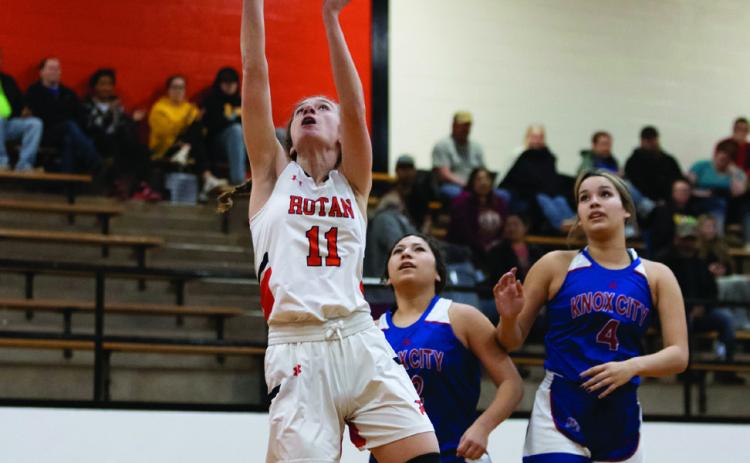 Rotan's Tylee Fillingim cuts through the Houndette defense to put a shot during the Lady Hammers' 46-32 win over Knox City last Friday night. Photo by: Mark Martinez