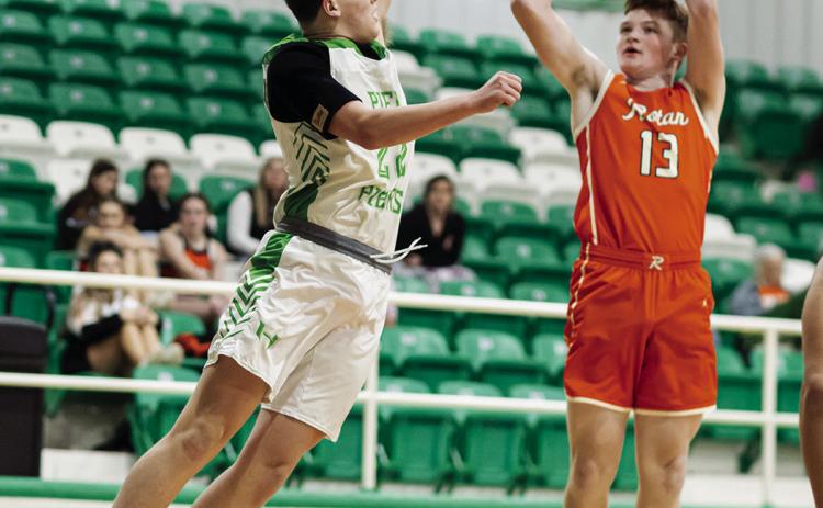 Rotan's Tucker McWilliams puts up shot over a Piper defender in the closing seconds of the Hammers' loss to Hamlin last Tuesday. PHOTO BY: MARK MARTINEZ