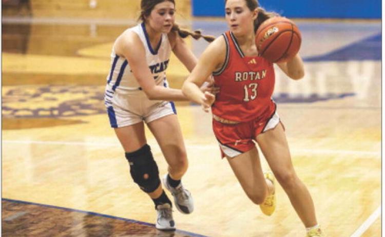 Rotan's Avery Gonzalez begins to drive towards the basket during the Lady Hammers 45-22 win over Rule last Thursday night. Photo by: Mark Martinez