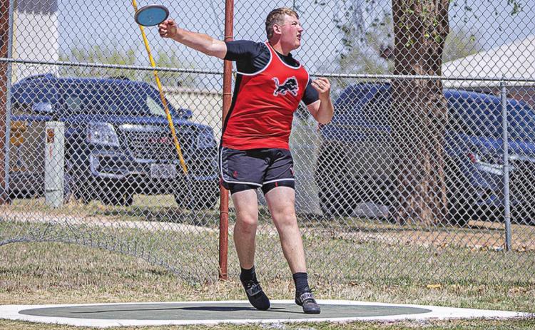 Roby Senior Jake Byers throwing the Discus.