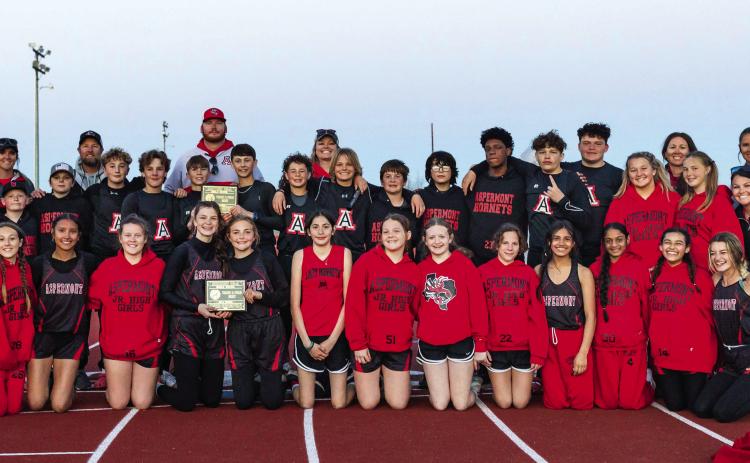Aspermont Junior High Stingers and Lady Stingers at the District 15A JH track meet in Roby Tuesday night. The Lady Stingers claimed the top spot, followed by 2nd place team Roby, and 3rd place team Rotan. The Aspermont boys also took home 1st place, followed by 2nd place Rotan, and 3rd place Roby . Photo by Mark