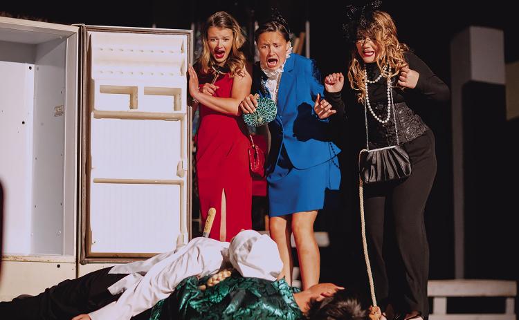 Roby CIS OAP performance of “Clue” Staleigh Young and Kailyn Shipp, and Christy Kelley gasp as a dead body falls out of the refrigerator. PHOTO BY MARK MARTINEZ
