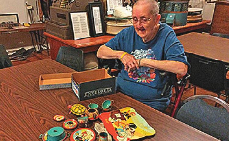 Long-time member Bobbie Fry showed her toys given to her by her teachers of 1st, 2nd and 3rd grade!