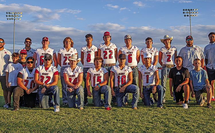Roby Lion Varsity Football Team: Coach Israel Deleon, Coach Zack Ryan, Kooper McWilliams, Brennan Faucett, Cruz Perez, Ethan Hernandez, Kody Daniel, Gageden Barrera, Josh Adames, Coach Johnny Sanchez, Coach Caleb Williams. Kneeling L-R: Grayson Carreon, Brady Shoemaker, Martin Cantero, Drew Carreon, Case Harris, Zac Flores, Dylan Lujan, Keegan Encizo. Kaedyn Field and Kolter McWilliams