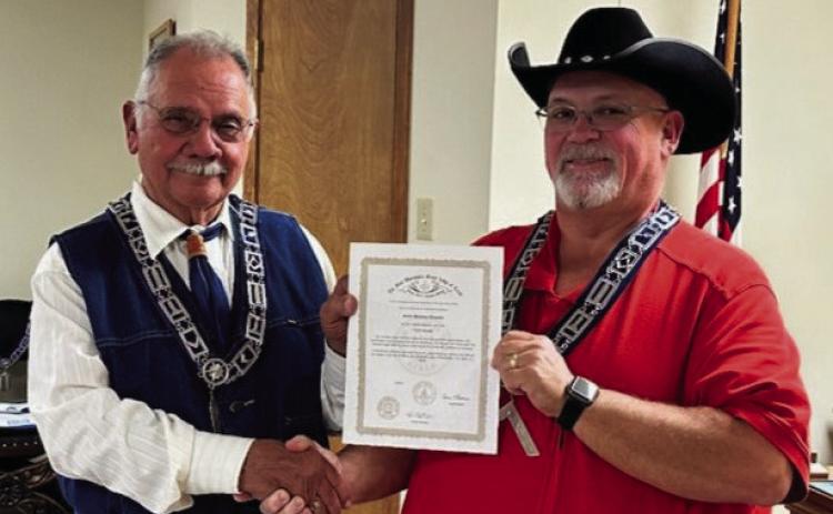 Brother Brooks receiving his award from the Worshipful Master Jay Hagins
