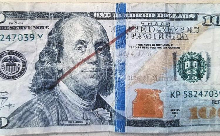 One of at least seven counterfeit $100 bank notes that have been discovered in circulation in Fisher County.