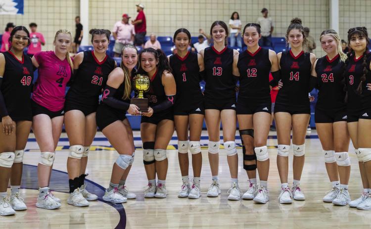 Top: Aspermont Lady Hornet District Champion Volleyball Team L-R: Vaani Bhakta, Matti Polk, Shelby Roberson, Raelynn Bradley, Peyton Calamaco, Emilee Silva, Keslie Criswell, Jessi Rabel, Maleah Hecht, Regan Polk, Noemi Garcia. Photo by: Mark Martinez