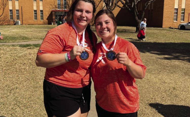 The Hammer Tennis girl's doubles team consisting of seniors Chesney Fronterhouse (left) and Hayden Foster (right) brings home a pair of medals after finishing 3rd at the South Plains tennis meet in Levelland on Tuesday.