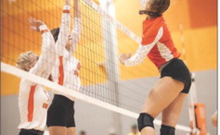 Lady Hammer Senior Becca Kincheloe fires a kill over Lady Dragon defenders during Rotan's win over Paducah Tuesday night. Photo by Mark Martinez