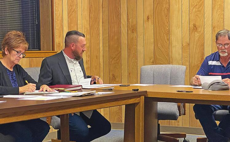 Aspermont City Mayor Steven Ellis reads Councilman Chad Criswell's resignation letter during Tuesday's meeting