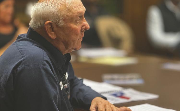 Stonewall County Commissioner Shorty Martin listens as representatives from ENGIE North America outline plans for the upcoming Swenson Solar Project during the October 27 Commissioners Court meeting in Aspermont.