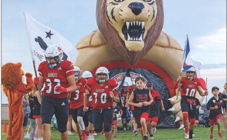 Roby CISD's Little Lions got to run out of the tunnel with their 'Bigs' before the game Friday night.