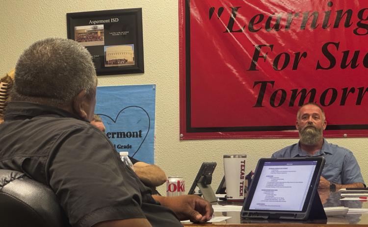 AISD Board President Lorenzo Calamaco and Superintendent Zach Morris share opposing views during Monday's meeting.