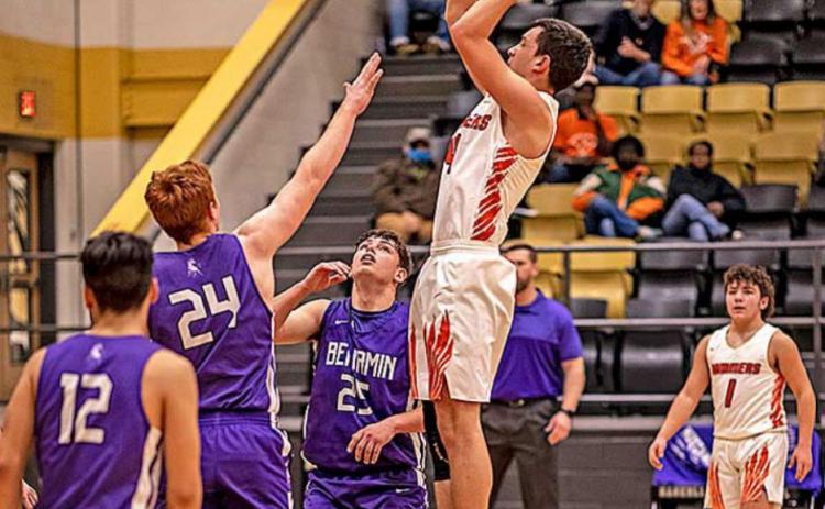 Rotan Senior, Koy Bell hangs in the air to shoot for two points.