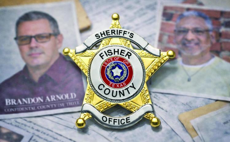 TWO NAMES, ONE BADGE, LOTS OF QUESTIONS