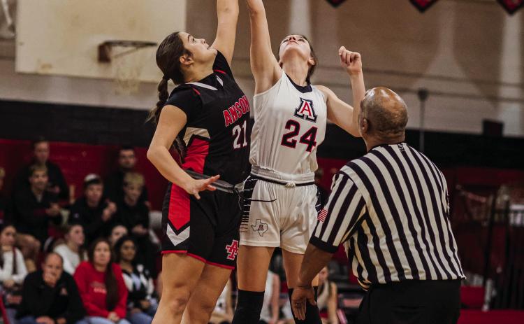 Freshman Keslie Criswell wins the jump ball during the Lady Hornets 46-34 win over the Anson Lady Tigers Tuesday night Aspermont. The Lady Hornets will take part in Roddy Shipman Classic Tournament in Guthrie this weekend. PHOTOS BY: MARK MARTINEZ