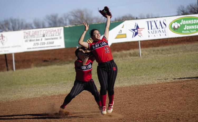 Roby's Samarra Frausto goes up for the ball to make a quick out during the Lady Lions 21-15 win over the Baird Lady Bears Tuesday afternoon in Roby. The Lady Lions found themselves in a back and forth with the Lady Bears through 4 innings. From the 5th inning onward, the Lady Lions locked in, scoring 11 runs, whilst holding Baird to just 3 to finish on top. The Lady Lions will next host Knox City this Saturday at 10am in Roby. Photo by: Mark Martinez