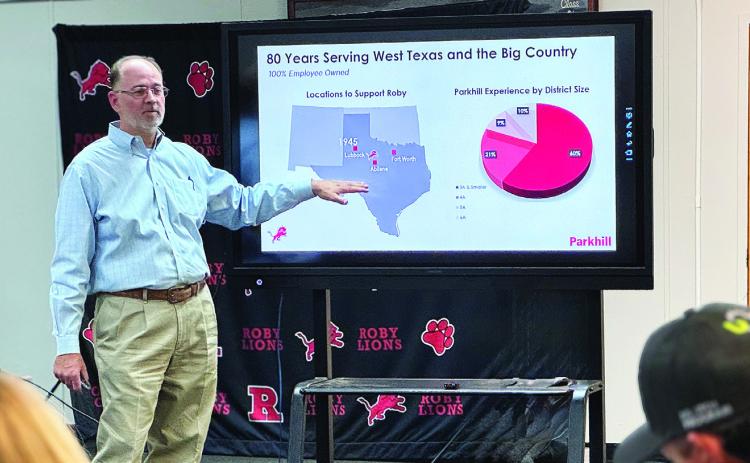 Parkhill partner Allan Wolf, a bond-planning specialist, outlines the firm's 80 years of experience working with school districts across the region during Roby CISD's Sept. 23 special-called meeting.