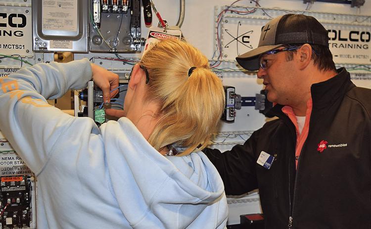 TSTC Industrial Systems instructor Daniel Diaz (right) works to make sure that students are prepared for a career while also taking the time to ensure that they have success in their lives. (Photo courtesy of TSTC.)