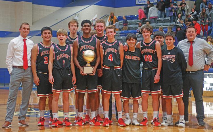 B-District Champions: L to R Back Row: Coach Cade Brown, Chris Mendez, Olen Johnson, Justin Martin, Junior Hernandez, Front Row: Keltyn Van Meter, Donovan Miller, Kade Morris, Toma Osai, Wesley Koenig, Carson Guidry, Coach Mark Weaver. (Photo by Mark Martinez)