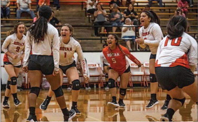 Set 1 25-19 Rotan Set 2 25-6 Rotan Set 3 25-22 Rotan (Above) Lady Hammers celebrate a game point from Senior Ana Daniel during Rotan’s 3-0 win over Munday on Tuesday night.