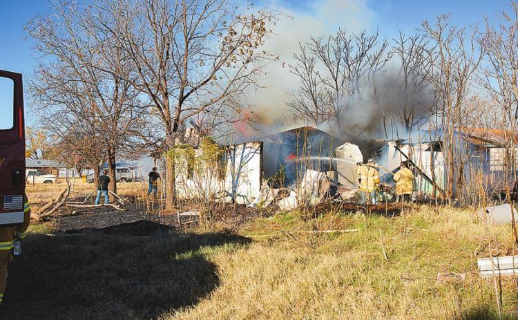 Firefighters battle Rotan house fire