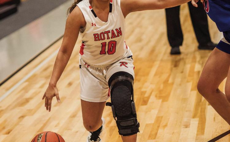 Rotan Junior Shyanne Gaspar looks for a driving lane during the Lady Hammers 63-22 win over Knox City. PHOTO BY MARK MARTINEZ