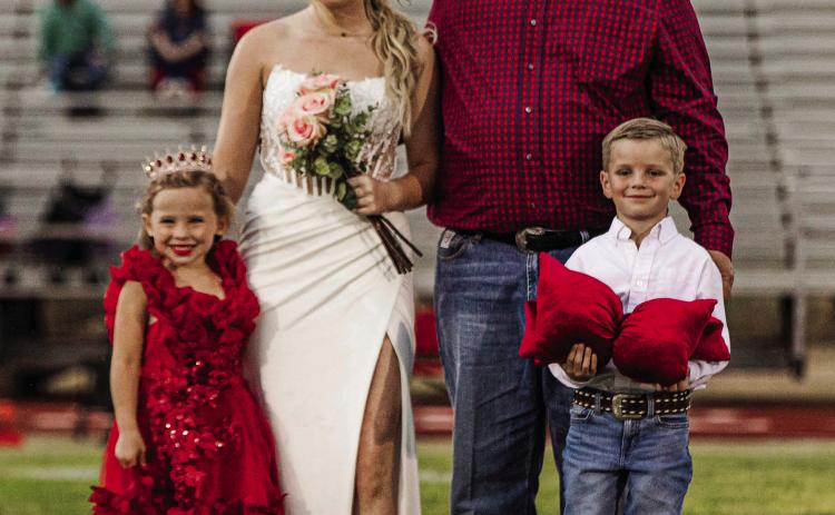 Mattie Polk, escorted by her father, Shane, was crowned the 2025 Aspermont Homecoming Queen last Friday night before kickoff. Crown bearers were Audrey Ballard and Carter Shields.