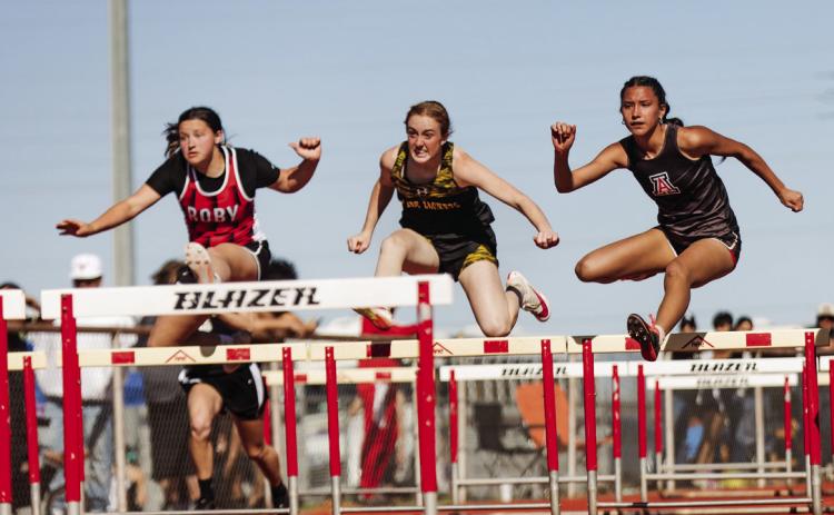 Roby's Kailyn Shipp (left) &amp; Aspermont's Emilee Silva (right) battle in the 100 M Hurdles. PHOTO BY: MARK MARTINEZ