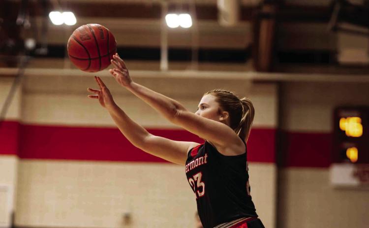 Senior Matti Polk fires a corner three-pointer.