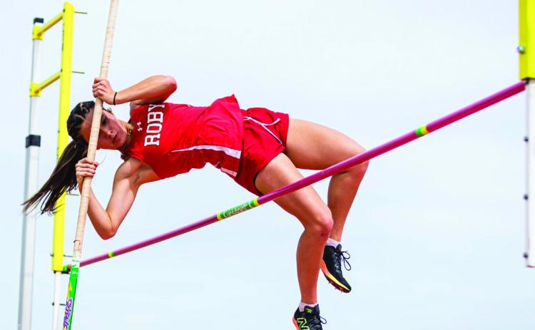 Roby senior Lilly Benson competing in the pole vault during Roby's Cottonwood Creek Relays last Thursday. Benson was top individual performer at the meet, coming away with gold in the pole vault, 400, 1600, and 3200. Her efforts helped the Lady Lions secure a 3rd place team finish against stiff competition from other participating schools including the likes of: Sweetwater, Roscoe, and Hermleigh among others. PHOTO BY: MARK MARTINEZ