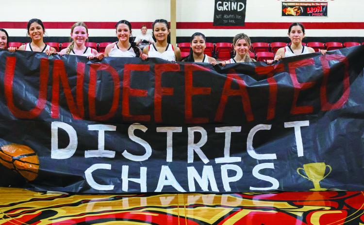 District 15-A Champion Roby Lady Lion Basketball Team L-R: Avery Carreon, Yessica Perez, Keegan McWilliams, Hailee Garmer, Joselynn Williams, Carly Jimenez, Lilly Benson, Ivy Espinoza, Chasity Benson. The Roby Lady Lions finished out their season on top, defeating the Paint Creek Lady Pirates Tuesday night 71-8 to go undefeated in district play. The Lady Lions will begin their post-season campaign against Vernon Northside this coming Tuesday at 7:15pm in Munday. PHOTO BY MARK MARTINEZ