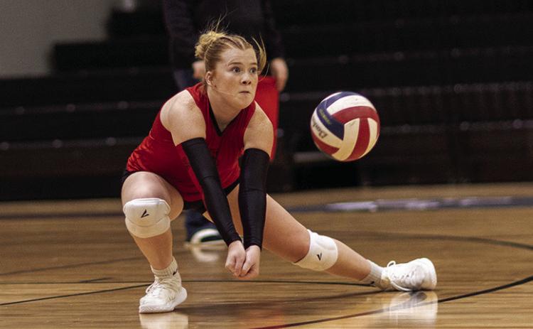 Junior Matti Polk goes low for a dig during the Aspermonts' match against Hawley Tuesday night. The Lady Hornet's fell in 3 sets to the Bearcats (11-25) (16-25) (10-25). The Lady Hornets next game will be this Saturday against Klondike. Photo by: Mark Martinez