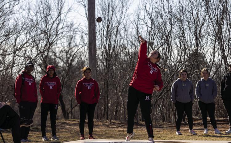 Senior Calie Hernandez throwing the shot put. Photo by Mark Martinez