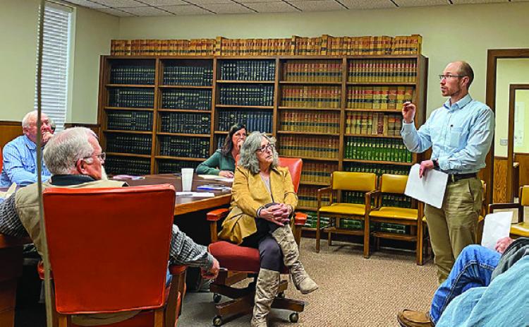Jake McAdams speaks to Stonewall officials on Monday about grant funding