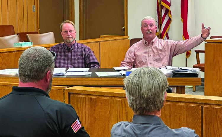 Fisher County Commissioners Preston Martin and Micah Evans discuss financial and operational expectations with Chief Deputy Jarod Smith and Sheriff Tom Pohlman during Monday's budget workshop
