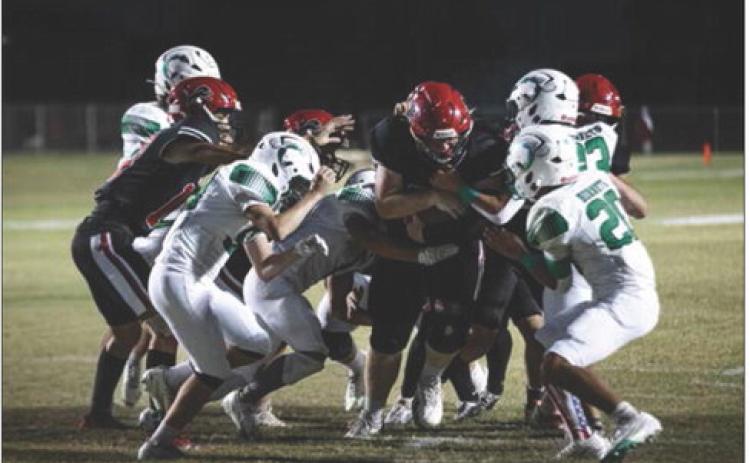 Senior David Adkisson powers through Hornet defenders to score during the Roby Lions 37-7 win over Blackwell last Friday on Homecoming. With the win, Roby improves its record to 2-1 on the season. This week, the Lions travel to Petersburg to take on the (0-3) Buffaloes. Photo by: Mark Martinez