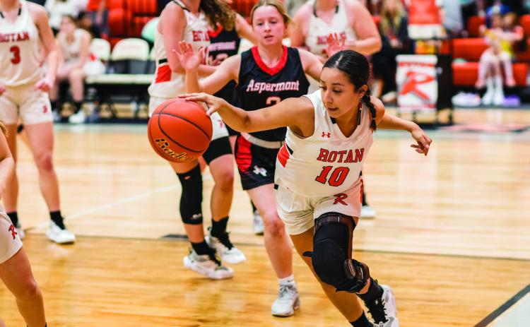 Rotan Junior Shyanne Gaspar narrowly keeps the ball in play during the Lady Hammers' 27- 46 loss to Aspermont Tuesday night. PHOTO BY MARK MARTINEZ
