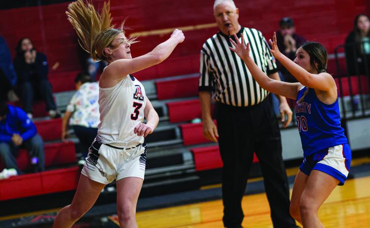 Aspermont's Mylee Van Meter keeps the ball inbounds during the Lady Hornets 63-21 win over Knox City Tuesday night. After defeating the Houndettes for the second time, the Lady Hornets are holding steady in district play at 2nd place. They will take the court this Friday in a non-district matchup at Newcastle starting at 5pm. Photo by Mark Martinez