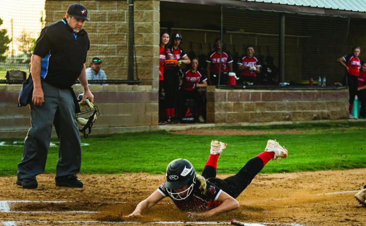Aspermont junior Mylee Van Meter slides into home plate to score the only run for the Lady Hornets last Thursday against Eula. The Lady Hornets fell to the Lady Pirates in a best-ofthree bi district round in Hawley; 15-0 in game 1, followed by 15-1 in game 2. They finish with an overall record of 4-5 (4-3 District). PHOTO BY: MARK MARTINEZ