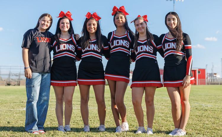 L-R: Mascot, Kailyn Shipp. Cheerleader L-R: Destiny Alaniz, Gemma Noell, Yessica Perez, Kassidy Daniel. Samarra Frausto. Not pictured: Keirstyn Pippin, Carly Jimenez. Photo by: Tricia Hurt